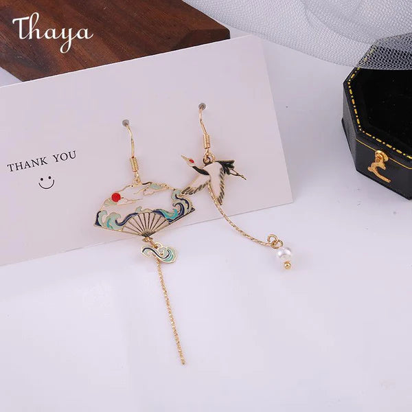 Thaya Asymmetric Crane Fan Earrings