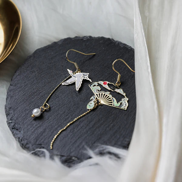 Thaya Asymmetric Crane Fan Earrings