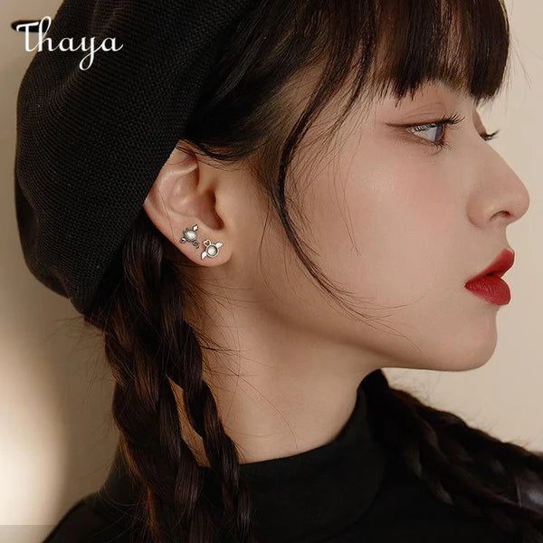 Thaya Angel And Demon Stud Earrings